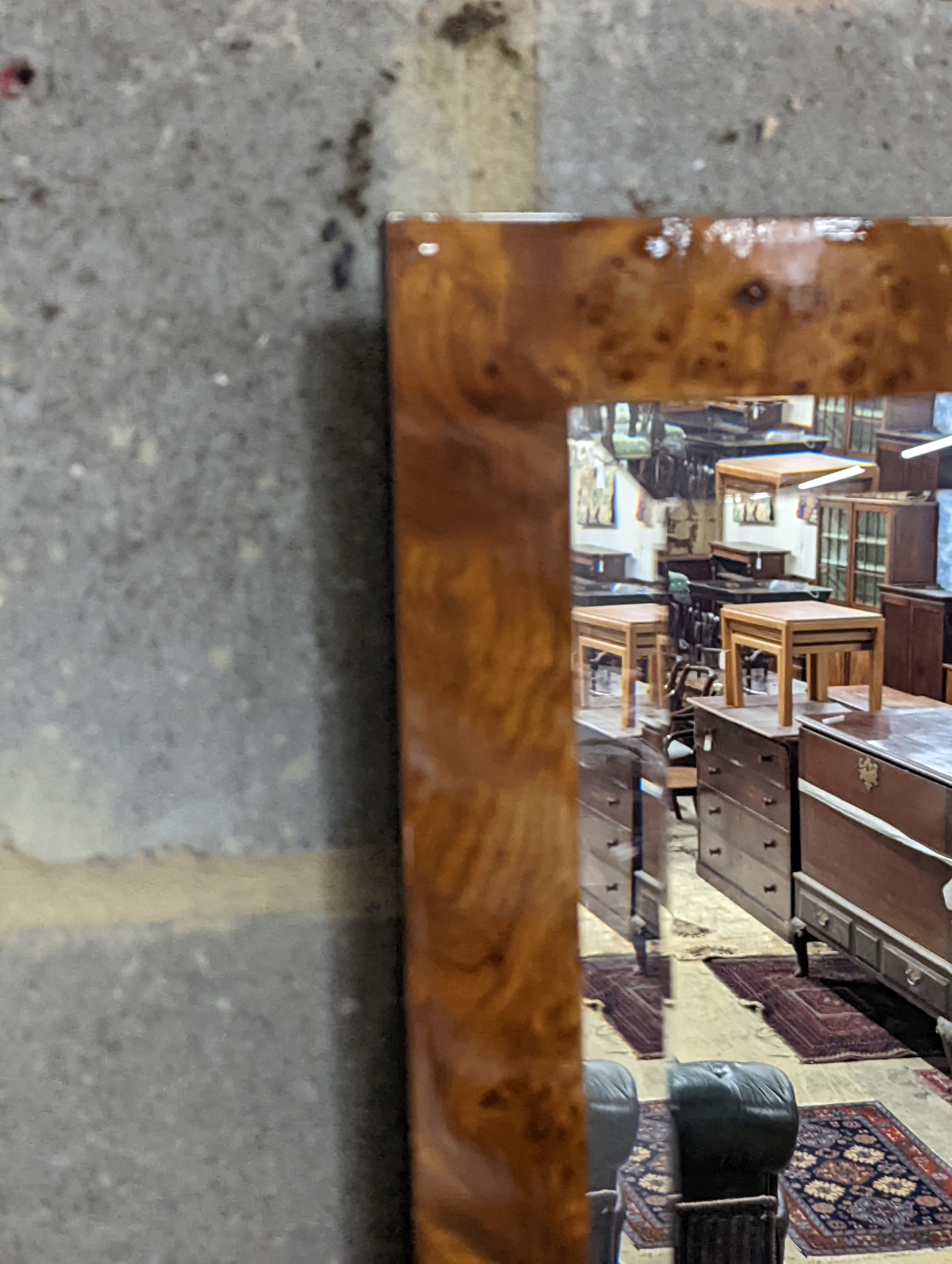 A modern rectangular wall mirror in burr walnut frame, width 50cm, height 73cm